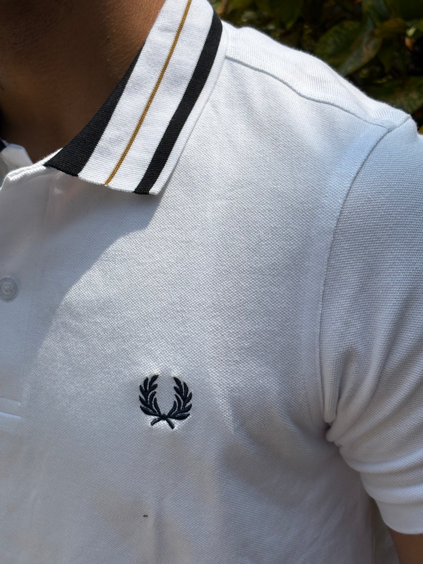 White Emblem Polo – Gold & Navy Trim